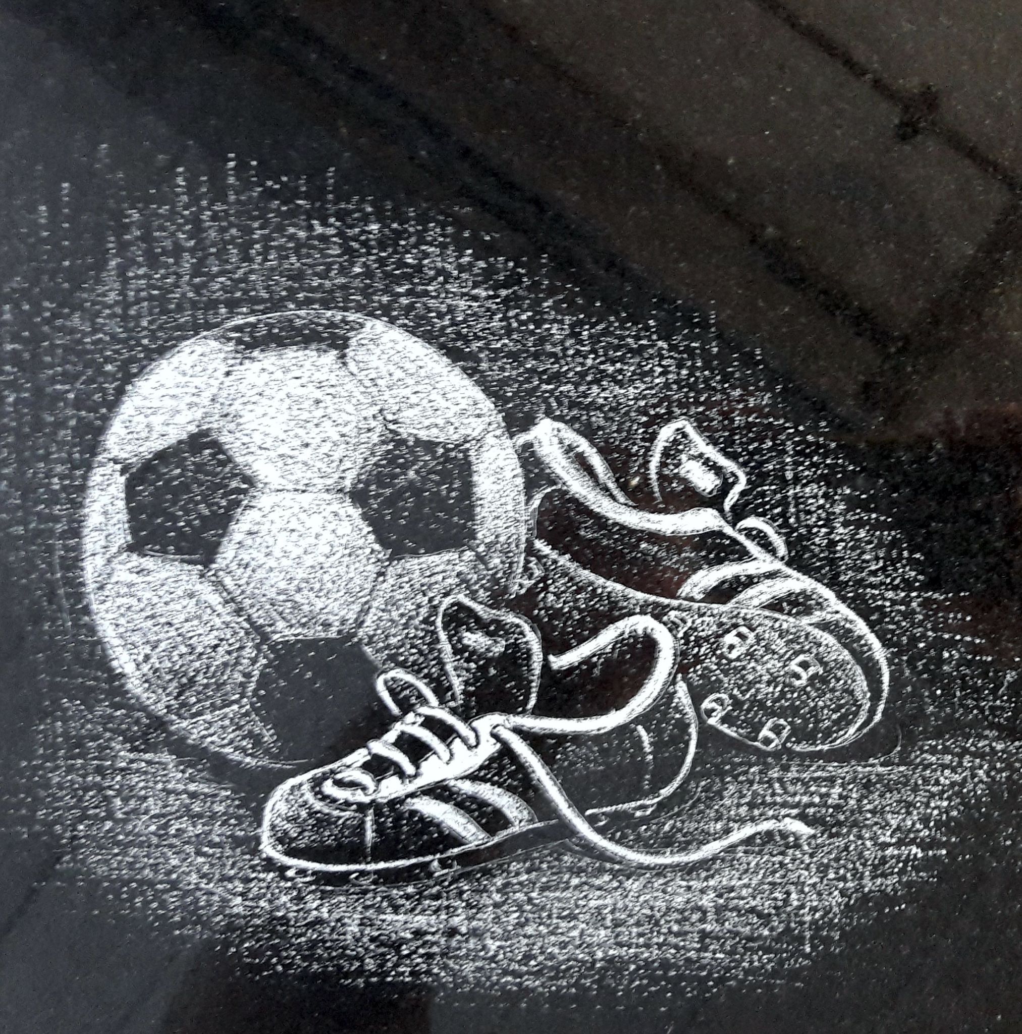 Ball mit Fußballschuhe